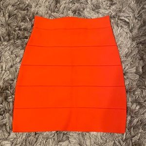 NEW BCBG vibrant orange body on bandage skirt S